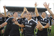 New Zeland players celebrate victory after the IRB Junior World Championship Final match between England and New Zealand at Plebiscito Stadium on June 26, 2011 in Padova, Italy