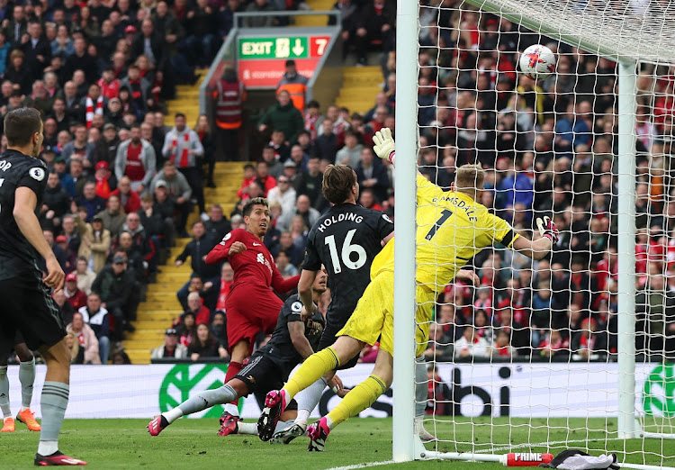 Roberto Firmino scores Liverpool's second goal in their Premier League game against Arsenal at Anfield in Liverpool, on April 9 2023.