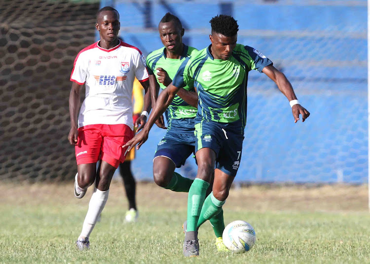 Rangers' Mersellus Ingotsi tries to stop KCB's Estone Esiye and Simon Munala in a recent match.