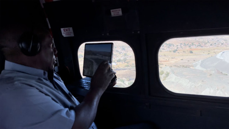 President Cyril Ramaphosa flying over the town of Jagersfontein, Free state, which was damaged by a mudslide after a tailings dam burst at the mine.