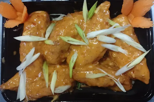 Chicken Momo Tossed In Delhi Style Sauce