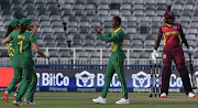 Ayabonga Khaka celebrates with her Momentum Proteas teammates after she took her maiden five-wicket haul during the second ODI against the West Indies at the Wanderers in Johannesburg on January 31 2022.  