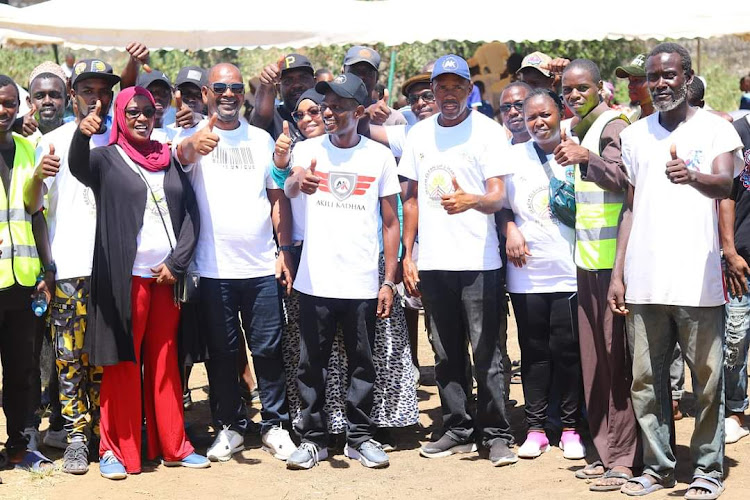 Akili Kadhaa CBO members before a beach clen-up exercise on Thursday.