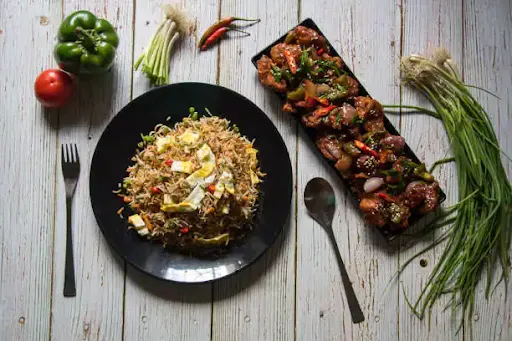 Fried Rice And Chilli Chicken With Pepsi