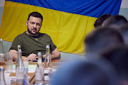 Ukraine's President Volodymyr Zelenskyy attends a meeting with local authorities during a visit to the southern city of Mykolaiv, as Russia's attack on Ukraine continues, on June 18 2022.