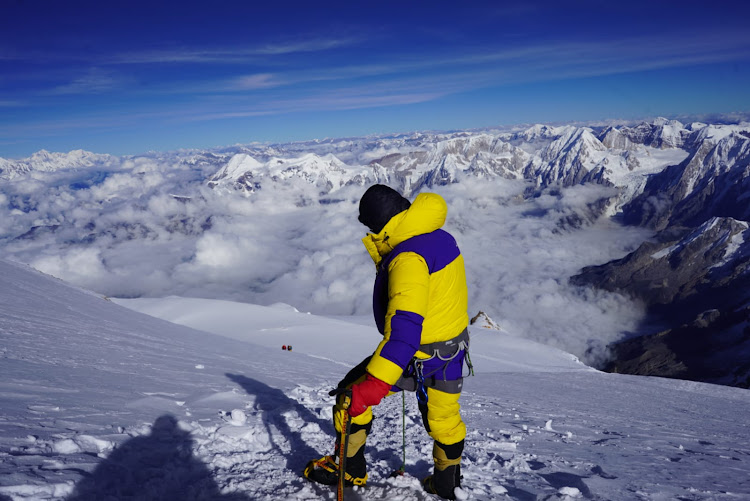 Cheruiyot Kirui stands above 8,000 metres in the 'death zone' near the summit of Mt Manaslu, Nepal, last year