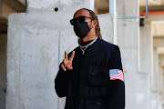 Lewis Hamilton of Great Britain and Mercedes GP walks in the Paddock during previews ahead of the F1 Grand Prix of Hungary at Hungaroring on July 29, 2021 in Budapest, Hungary.