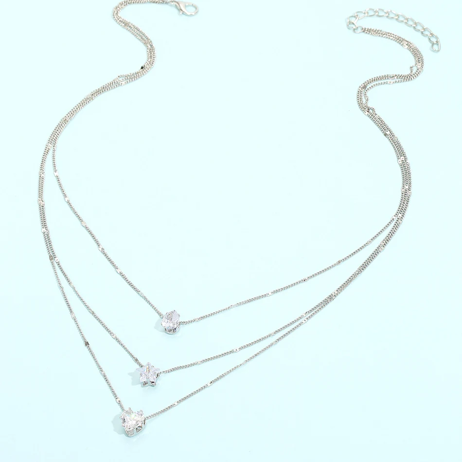 Collier femme élégant avec pendentif goutte d'eau en diamant, multicouches, simple et gracieux, parfait pour sublimer votre décolleté.