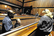 DARLING BOY: Radovan Krejcir smiles at his mother, Nadezda Krejcirova. The state opposed Krejcir's bail application yesterday, arguing that evidence his lawyers brought forward in a fresh bid for bail was not new