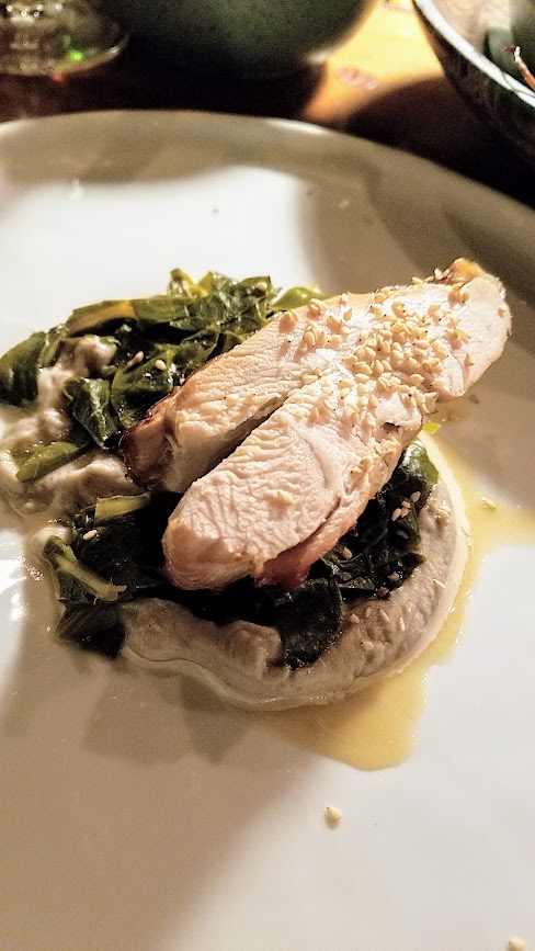 Langbaan Chefs Who Inspire Dinner with Edouardo Jordan of Salare and Junebaby, a collaboration with Chef Earl Ninsom of Langbaan to benefit Farestart. The main course is always a multitude of many dishes, and this is one of them, Slow smoked turkey breast over greens, field pea hummus, tahini, benne seeds