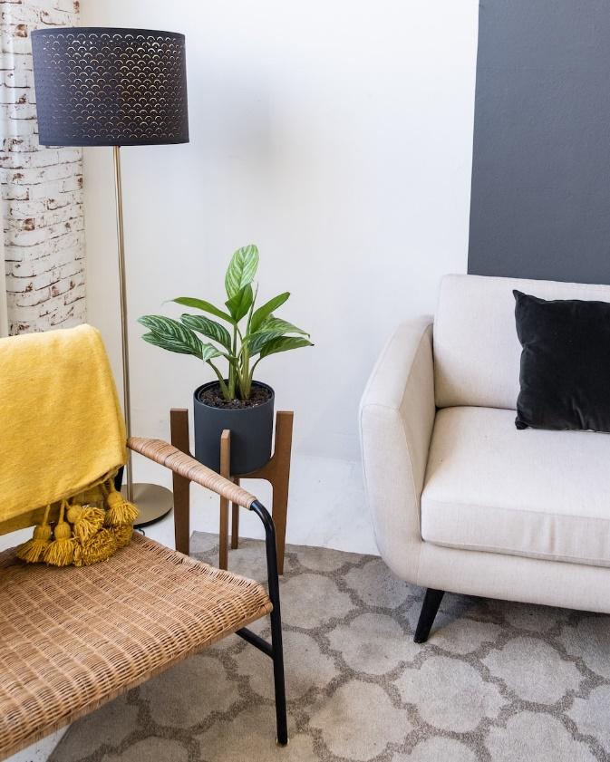 a living room with two chairs and a couch