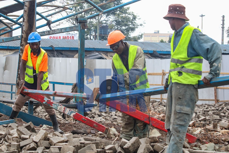 Workers at Muthurwa Bus terminus on March 29, 2022. The ongoing facelifting is managed by the NMS to help improve and improve traffic in the city.