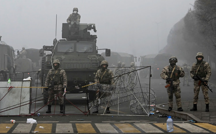 Troops are seen at the main square where hundreds of people were protesting against the government, after authorities' decision to lift price caps on liquefied petroleum gas, in Almaty, Kazakhstan January 6 2022. Picture: REUTERS/MARIYA GORDEYEVA