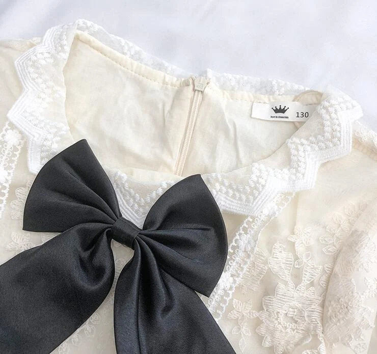 Falda de malla de manga larga simple para niños, ideal para vestir con facilidad y elegancia. Perfecta para niñas que buscan comodidad y estilo.