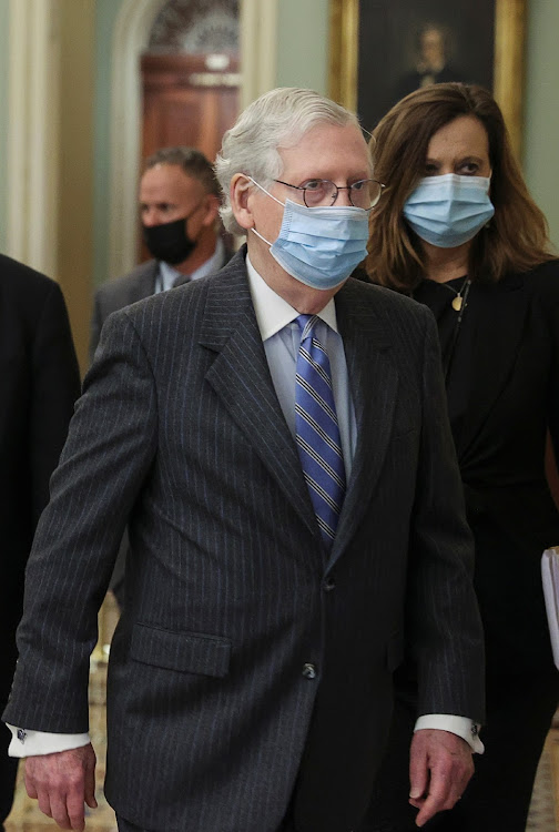 U.S. Senate Minority Leader Mitch McConnell arrives outside the Senate Chamber as the impeachment trial of former U.S. President Donald Trump, on charges of inciting the deadly attack on the U.S. Capitol, begins on Capitol Hill in Washington, U.S., on February 9, 2021.