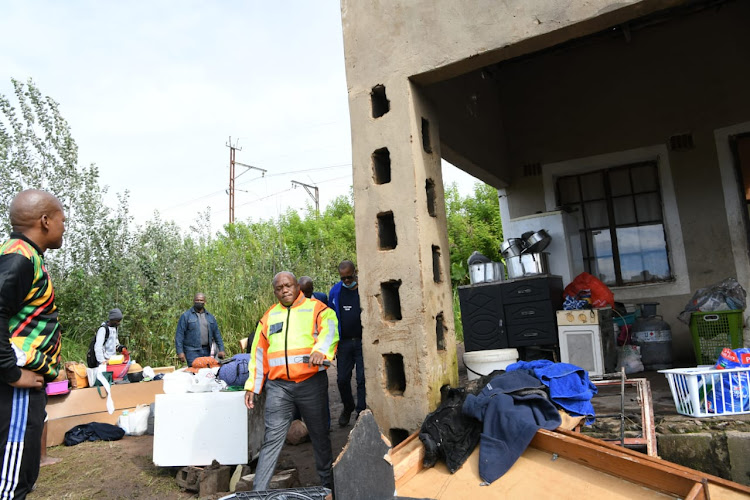 KZN premier Sihle Zikalala and co-operative governance and traditional affairs MEC Sipho Hlomuka visit two families in Georgedale who lost five relatives each during the rains.