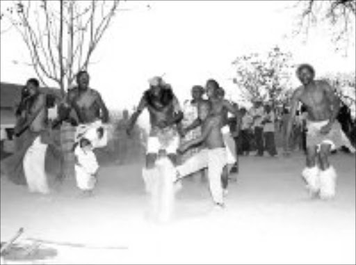 CULTURAL DANCE: Muchongolo dancers celebrate Heritage Day at John Matyeka bar lounge at Songeni village, near Thulamahashe in Mpumalanga over the weekend. Pic. Andrew Hlongwane. 26/09/07. © Sowetan.