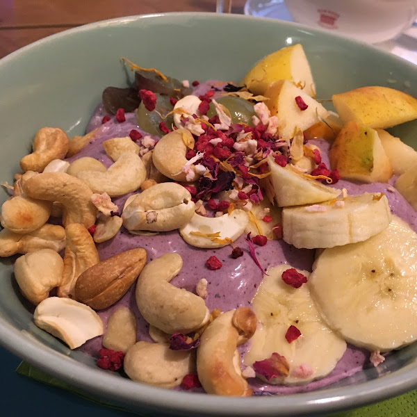 Breakfast Bowl (vegan, gluten free) with avocado-berry cream, fresh seasonal fruits and nuts