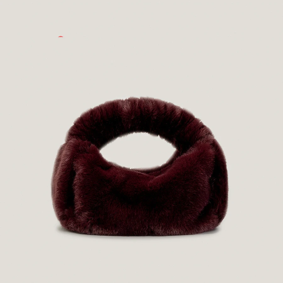 Bolsa de mão elegante e sofisticada com design de dumplings recheados. Perfeita para um look fashion e carregar seus essenciais.