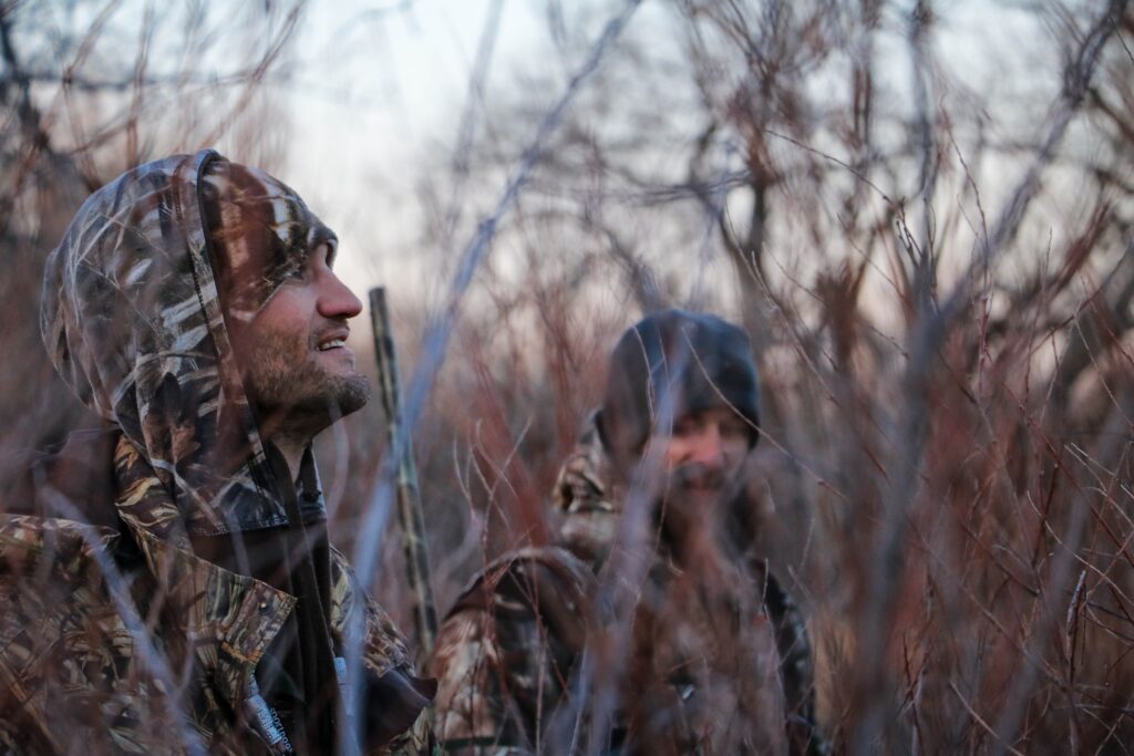 Hunters waiting for game, leasing hunting land