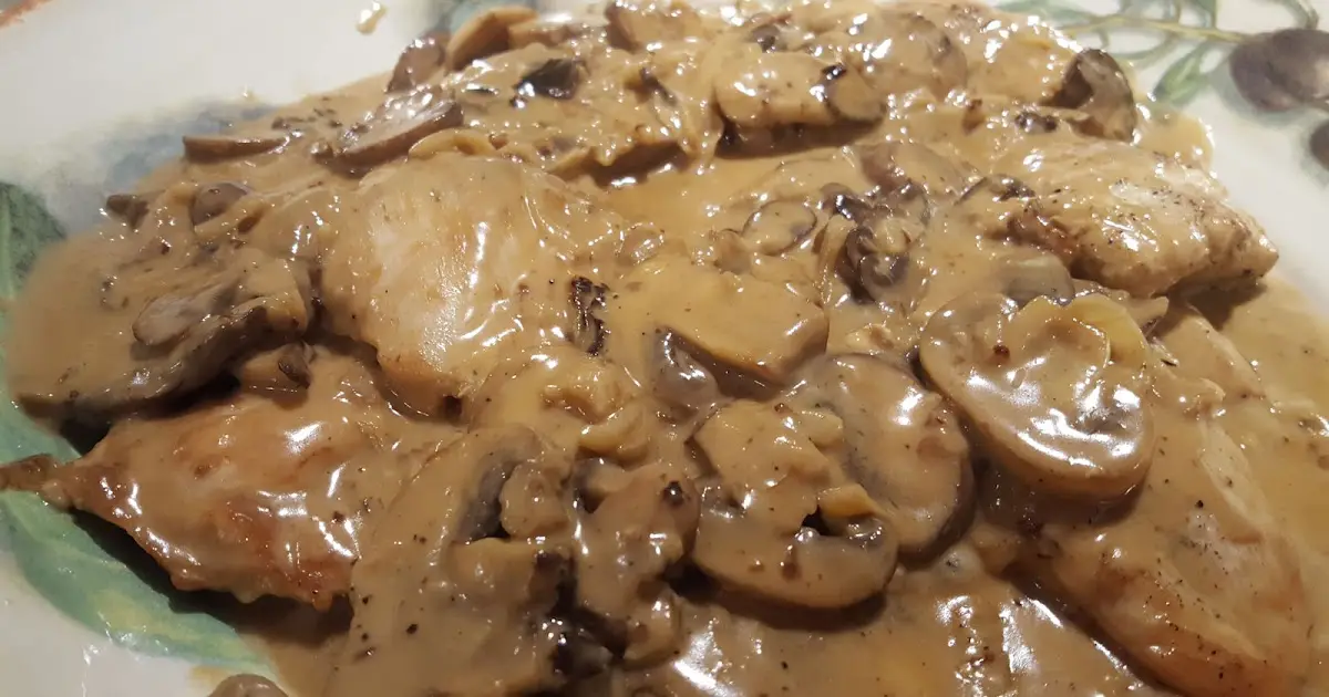 Creamy One Skillet Smothered Chicken Thighs - Dizzy Busy and Hungry!