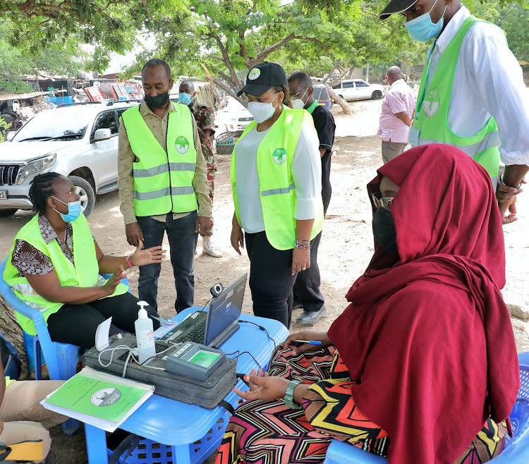 IEBC vice chairman Juliana Cherera when she visited Kilifi. Looking on is Kilifi county elections manager Abdulwahid Hussein