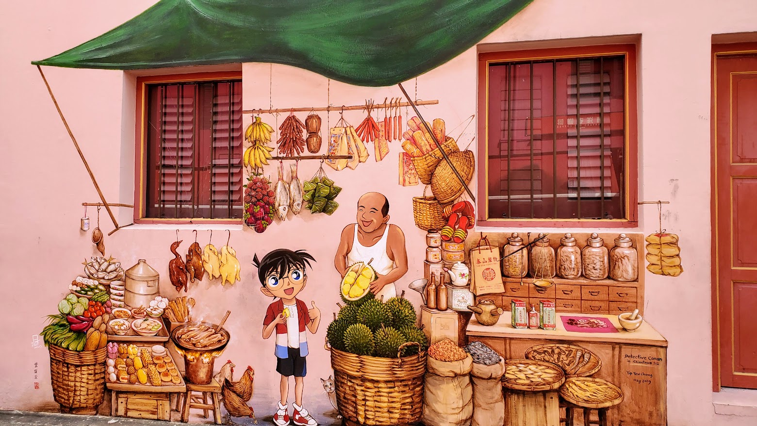 Things to do in Singapore: Street Murals by Yip Yew Chong famous for his depictions of the everyday life of his memories from Singapore in the 70s-80s