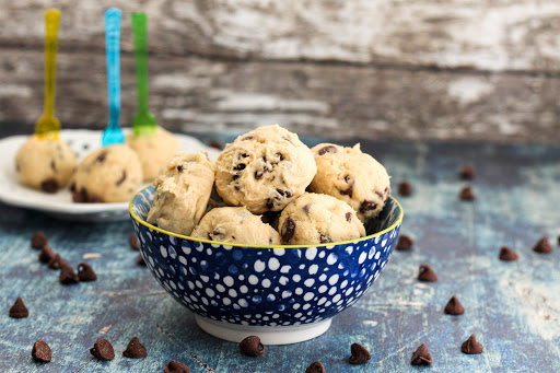 A bowl of Chocolate Chip Cookie Dough Balls.