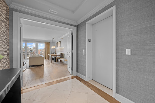 Entrance hall with elevator in this luxury apartment / penthouse for sale in Baltimore ($699,000)