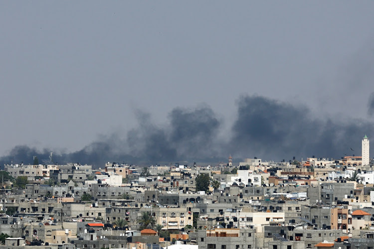 Smoke rises following an Israeli strike, in Khan Younis in the southern Gaza Strip May 9, 2023.