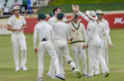 Pat Cummins of Australia celebrates after dismissing Senuran Muthusamy of South Africa during day 1 of the Tour match between South Africa A and Australia at Sahara Park Willowmoore on February 22, 2018 in Johannesburg. 
