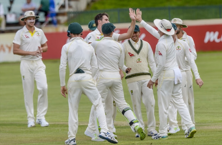 Pat Cummins of Australia celebrates after dismissing Senuran Muthusamy of South Africa during day 1 of the Tour match between South Africa A and Australia at Sahara Park Willowmoore on February 22, 2018 in Johannesburg.