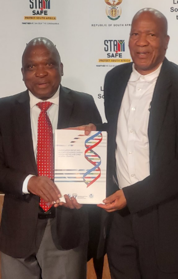 Health minister Joe Phaahla receives the final report on the Rahima Moosa Mother and Child Hospital from health ombudsman Prof Malegapuru Makgoba.