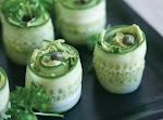 CUCUMBER ROLLS HORS D’OEUVRES WITH AVOCADO SPREAD was pinched from <a href="http://pureella.com/delicious-healthy-hors-doeuvres-cucumber-rolls-with-creamy-avocado/" target="_blank">pureella.com.</a>