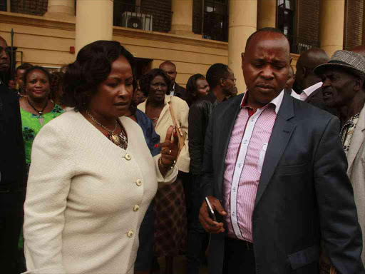 Machakos Wiper governor aspirant Wavinya Ndeti and running mate Peter Mathuki outside the Milimani law courts on May 15 /COLLINS KWEYU