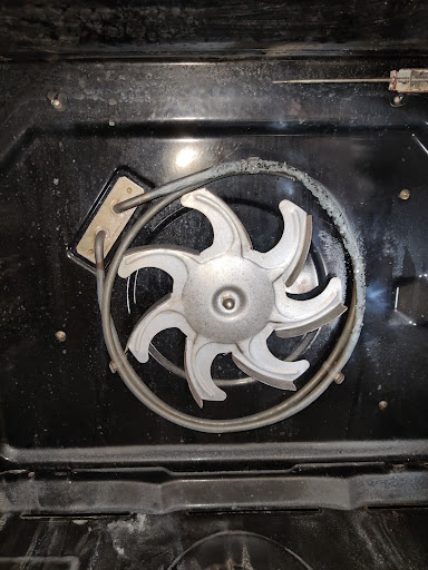 This faulty fan oven element was replaced.
