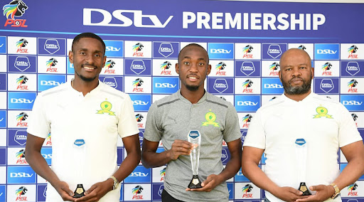 Mamelodi Sundowns striker Peter Shalulile is flanked by his co-coaches Manqoba Mnqgithi (right) and Rulani Mokwena after receiving their monthly PSL Awards.