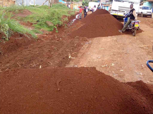 Some of the red soil that is being used to repair Kathageri-Kanyuabora road as pictured during a pprotest on May 16, 2016. /MARTIN RWAMBA