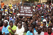 Nigeriens gather in a street to protest against the US military presence, in Niamey, Niger, on April 13 2024. File photo.