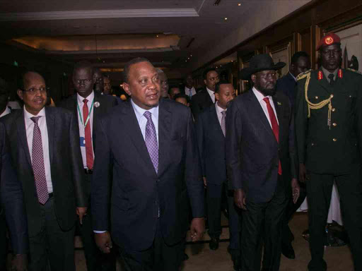 President Uhuru Kenyatta with South Sudan's Salva Kiir and other officials during the meeting of IGAD heads of state on the South Sudan peace process, June 21, 2018. /PSCU