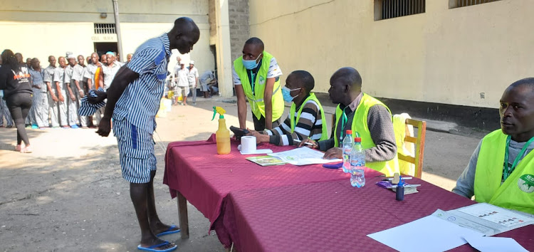 A prisoner during voting process at Kibos Maximum Security Prison in Kisumu on Tuesday.