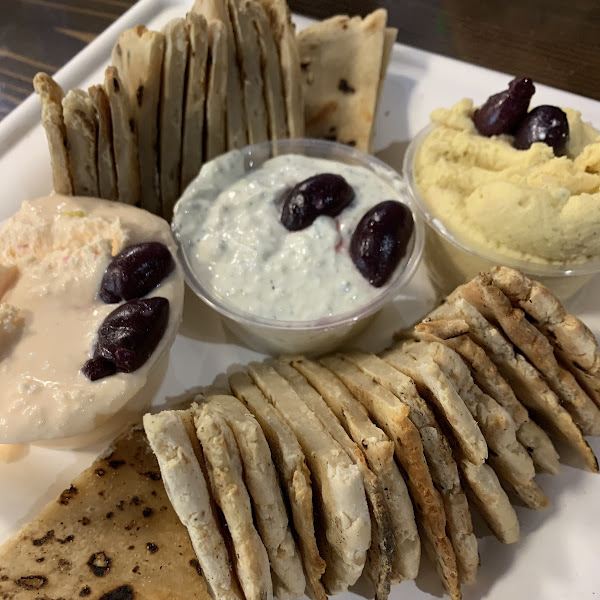 Gluten free house made pita made in a separate oven with three dips