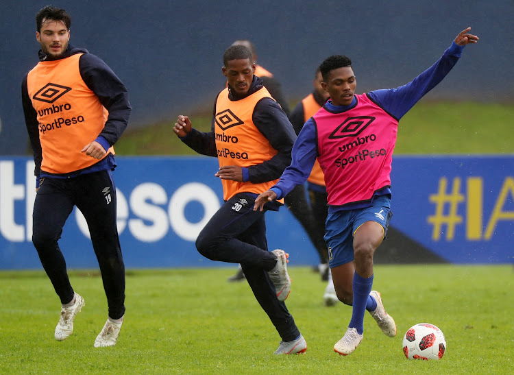 Gift Links of Cape Town City evades challenge from Craig Martin of Cape Town City during the 2018 MTN 8 Cape Town City FC Media Open Day at Hartleyvale, Cape Town on 25 September 2018.