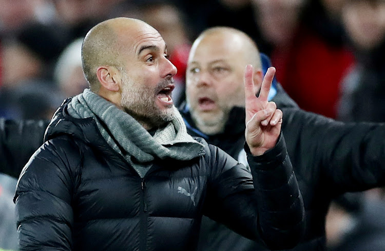 Manchester City manager Pep Guardiola gestures during a recent match