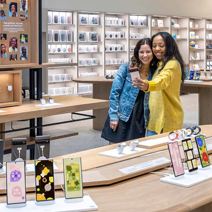 Customers try out Google products at the Google Store in New York