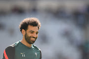 Mohamed Salah of Liverpool smile during a Liverpool training session at Stade de France in Paris, France. 
