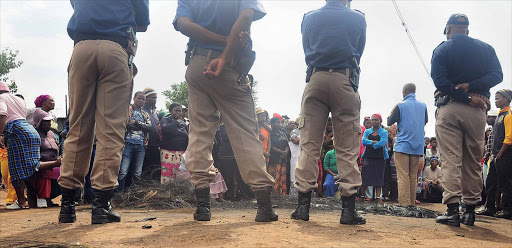 A part of the township without service and living in shacks, in protesting burned down a clinic which also serve the other part of the township with government houses and services. Picture Credit: Thulani Mbele