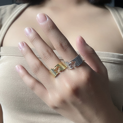 Title 1, Sterling silver ring with a simple design style...