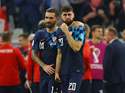 Croatia's Marko Livaja and Josko Gvardiol look dejected after the match as Croatia are eliminated from the World Cup.