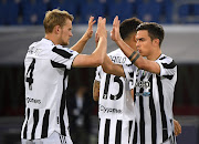 Juventus' Matthijs de Ligt with Paulo Dybala before the match.